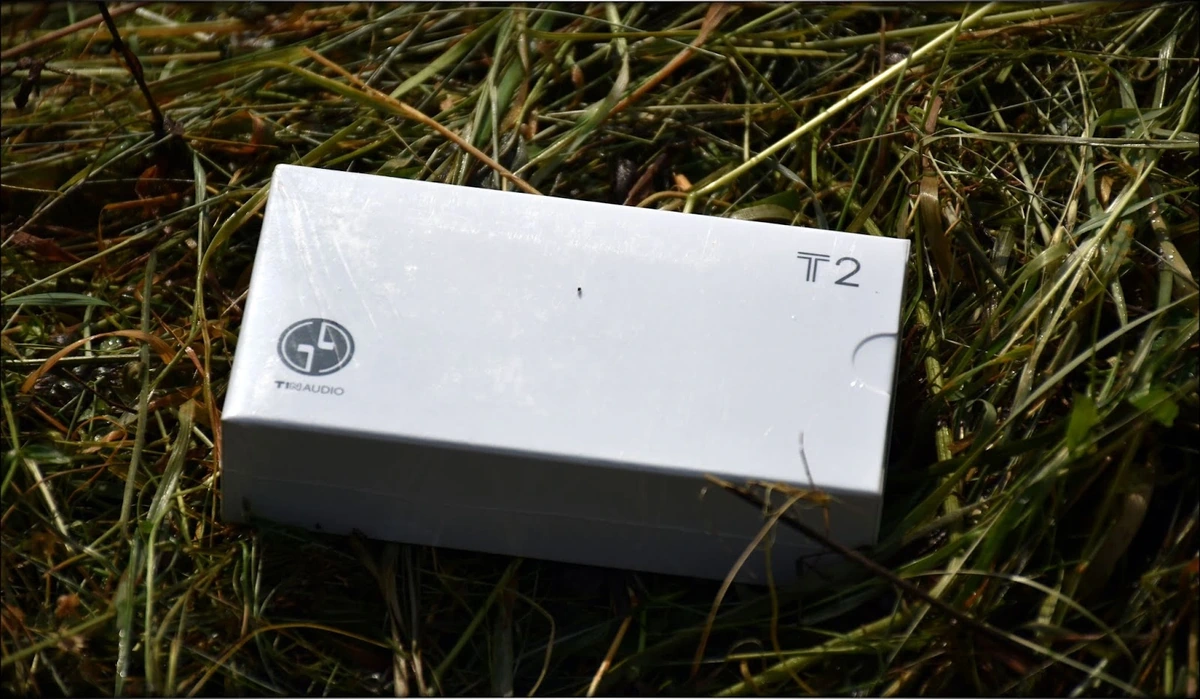 Tin T2 White Package, on a green, lively background